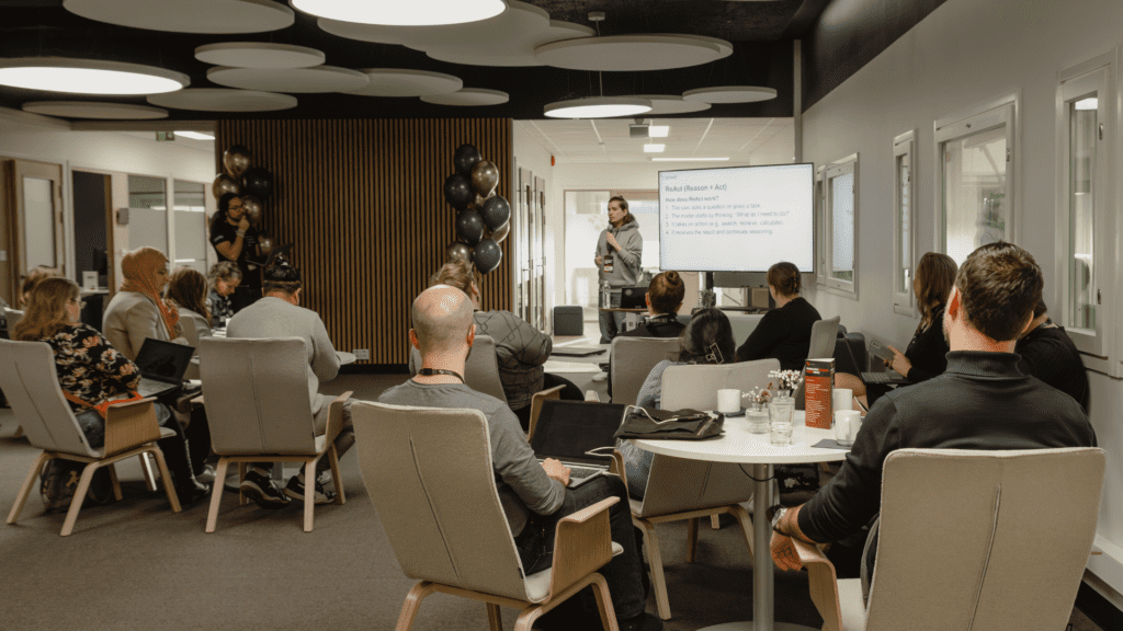 Workshop participants working on laptops during a morning session at Crazy Town’s third-floor lobby.