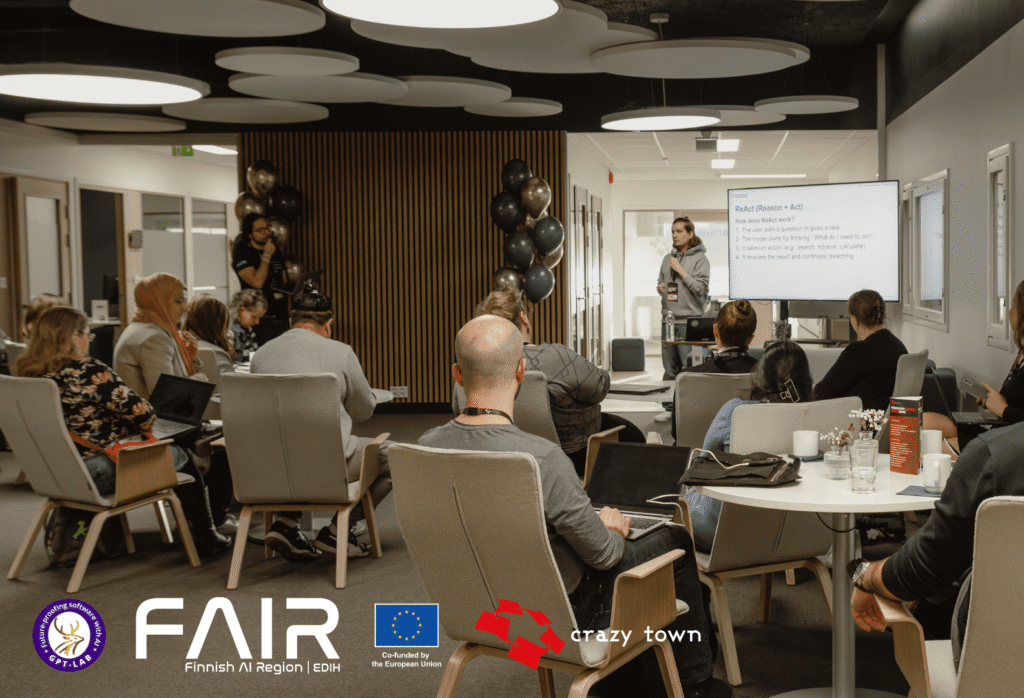 Workshop participants working on laptops during a morning session at Crazy Town’s third-floor lobby.